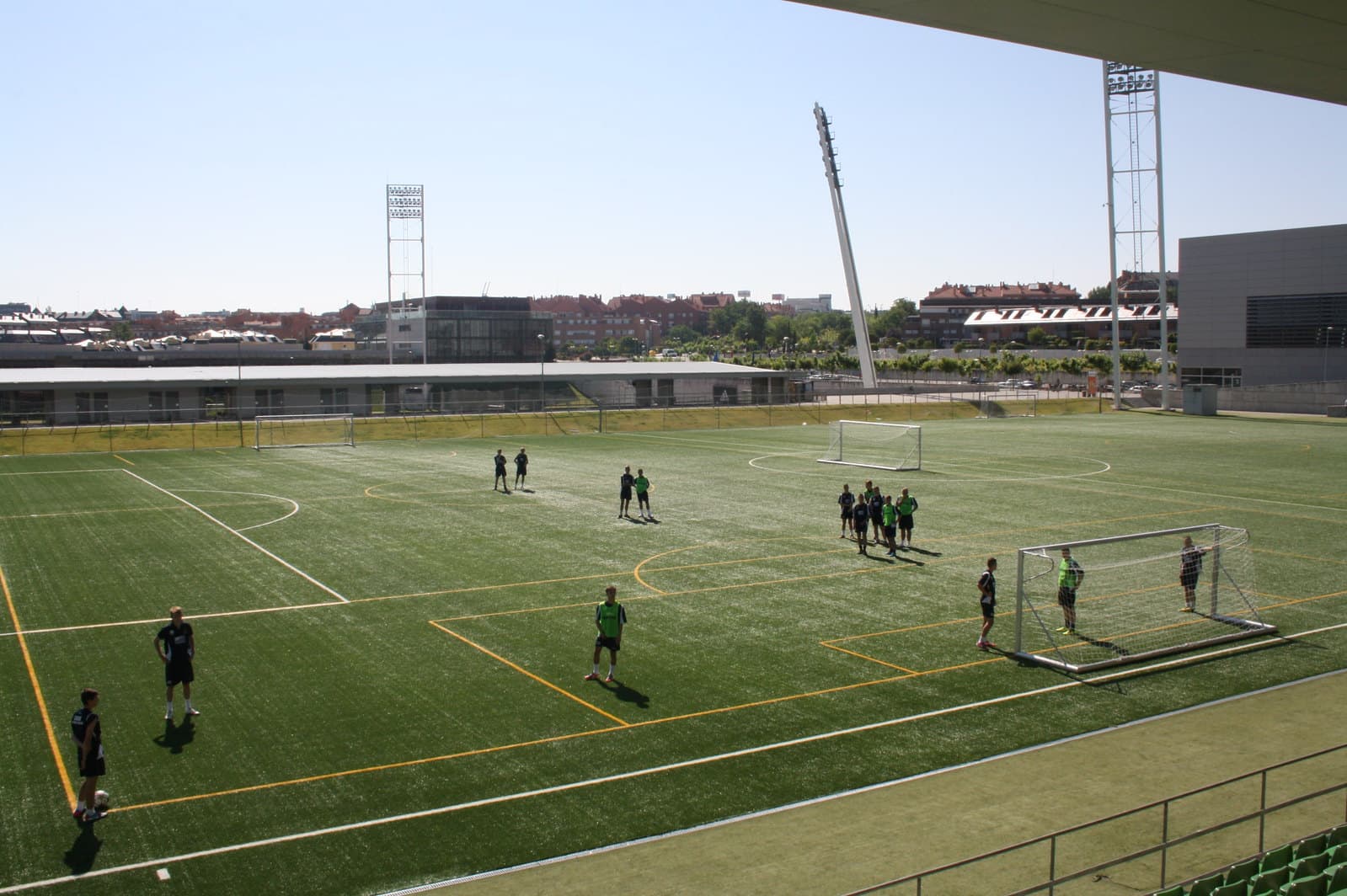 Youth soccer team training at professional facilities in Spain
